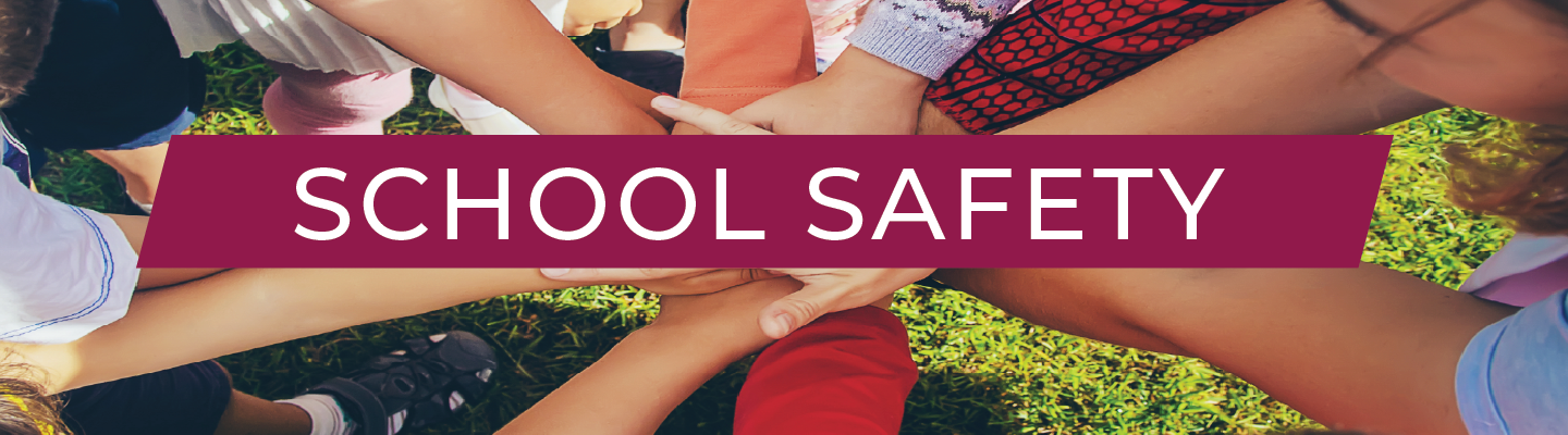 An image of many hands with a banner that says School Safety