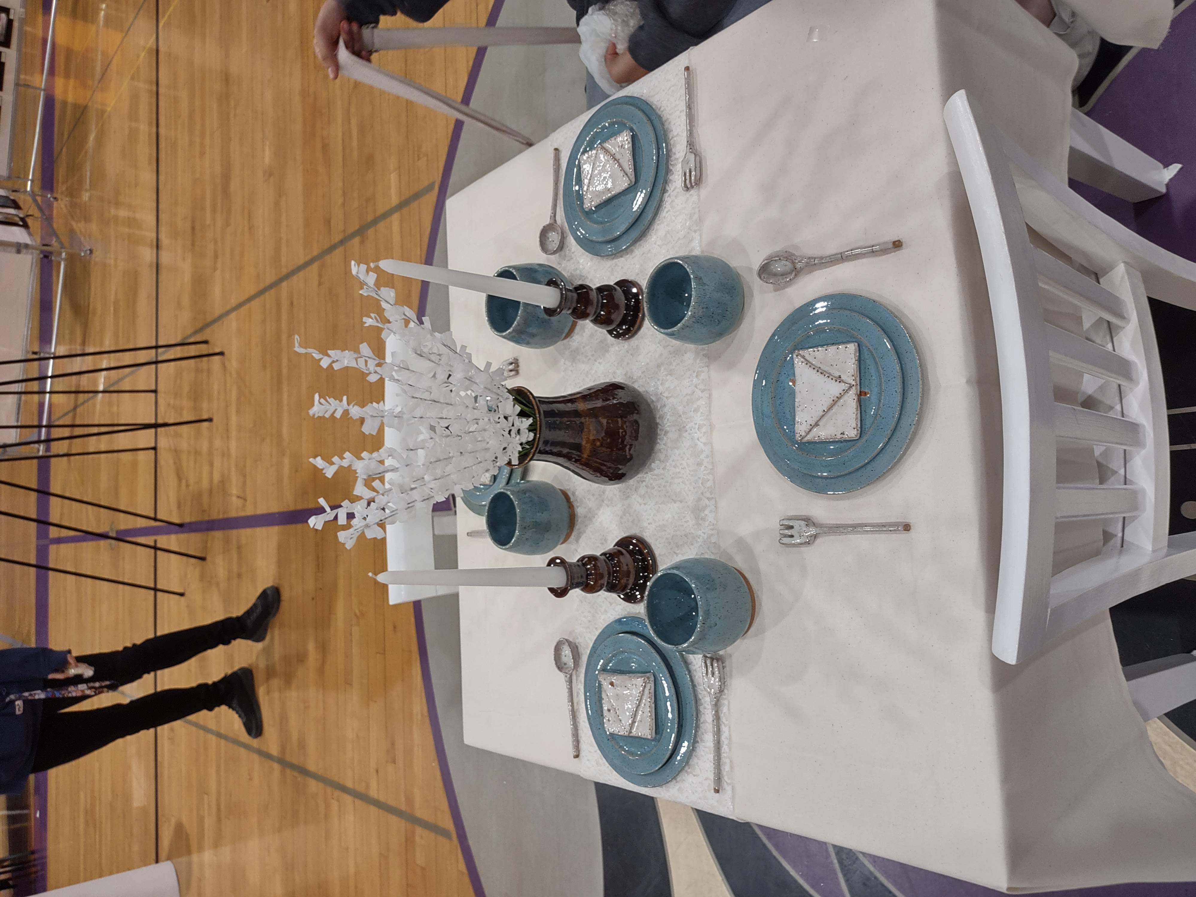 Image of dining table with ceramic place setting