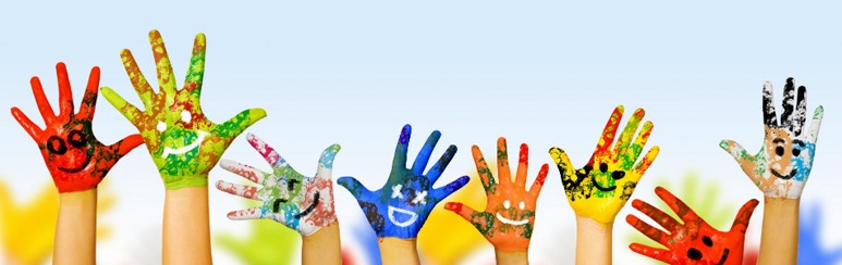 Eight hands painted with a rainbow of colors and smiley faces drawn on them