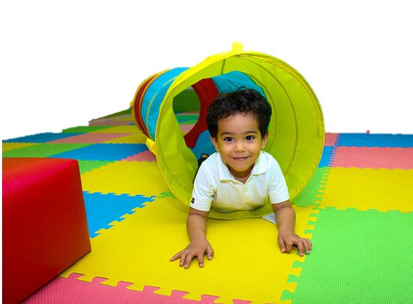 child having fun in preschool